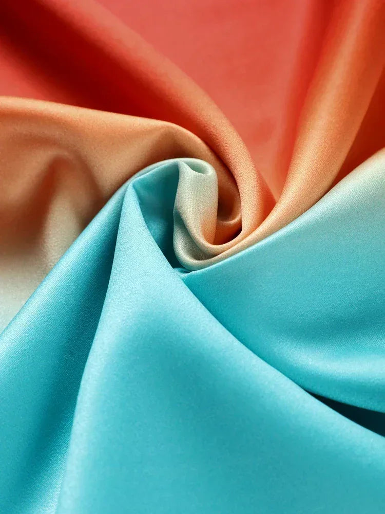 Vestido largo mujer en degradado naranja turquesa con recortes