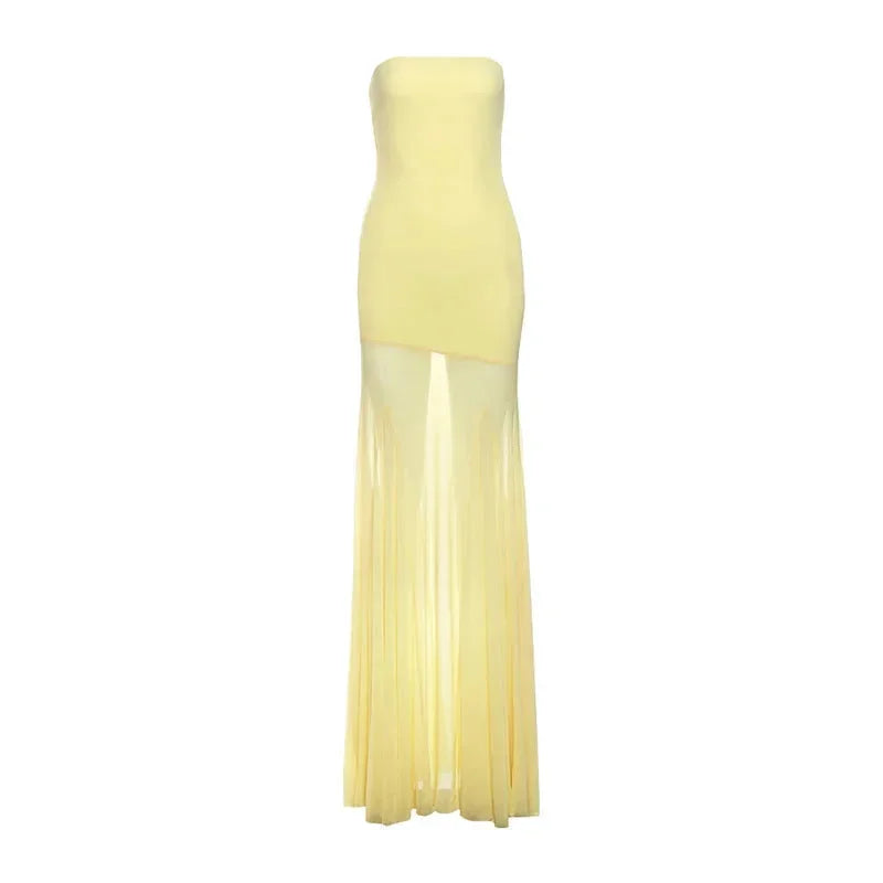 Vestido largo de mujer amarillo sin tirantes con falda transparente