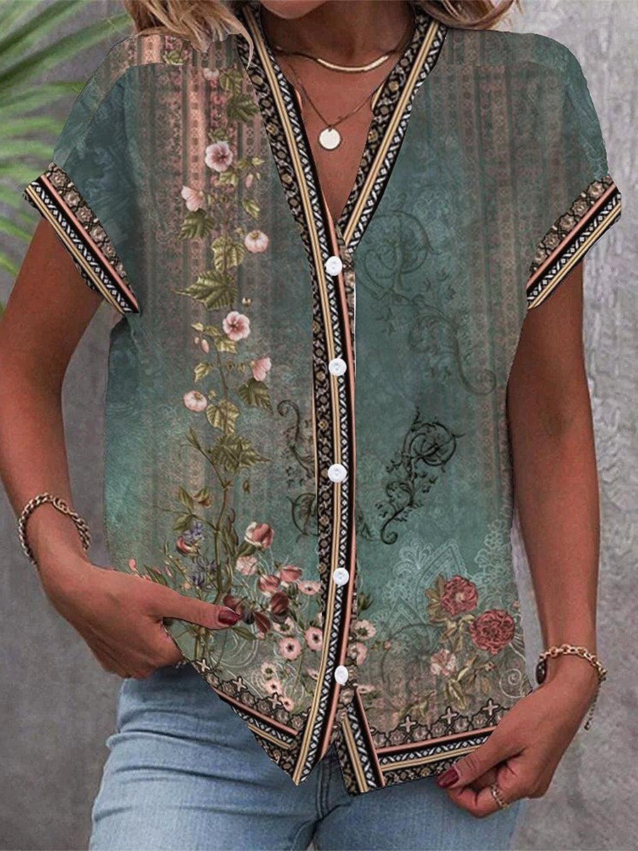 LUCÍA – Blusa bohémien leggera con stampa floreale, scollo a V e maniche corte