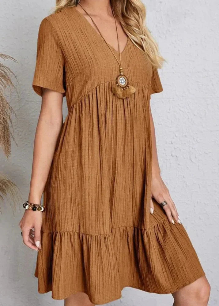 Elegante vestido que realza la cintura