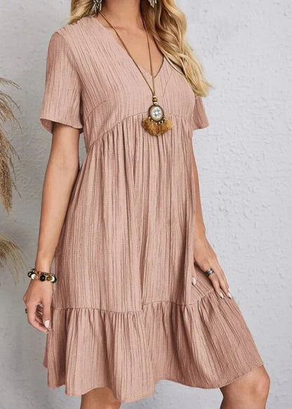 Elegante vestido que realza la cintura