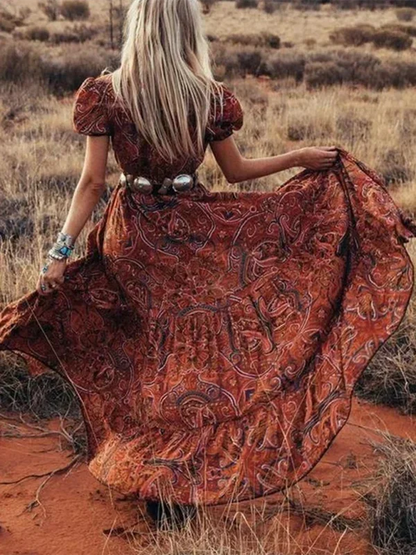 Vestido largo bohemio con estampado y mangas mariposa