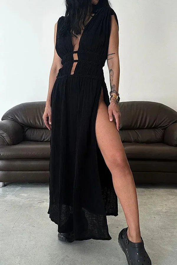 Vestido largo con espalda descubierta, recortes y abertura elegante