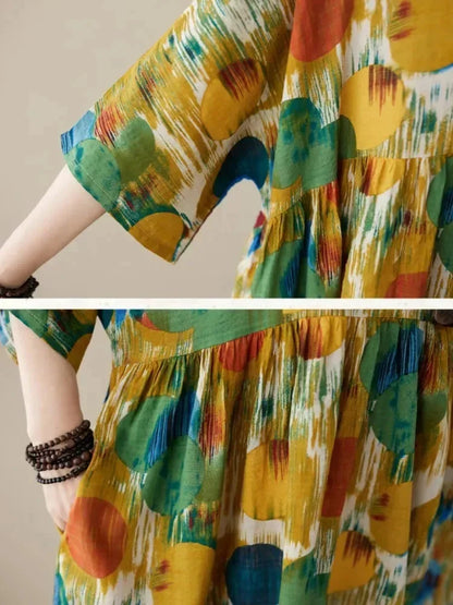 Vestido largo de mujer amplio con estampado artístico y mangas a media manga