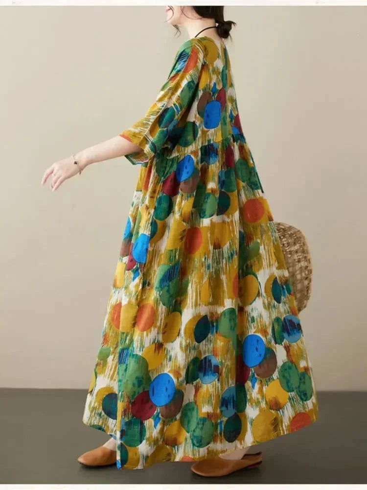 Vestido largo de mujer amplio con estampado artístico y mangas a media manga