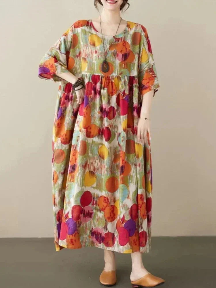 Vestido largo de mujer amplio con estampado artístico y mangas a media manga