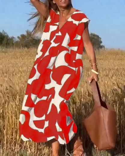 Vestido largo mujer con cuello en V y motivos fluidos