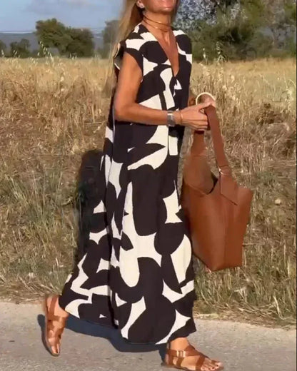 Vestido largo mujer con cuello en V y motivos fluidos