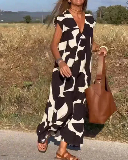 Vestido largo mujer con cuello en V y motivos fluidos