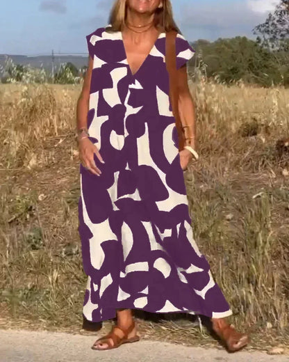 Vestido largo mujer con cuello en V y motivos fluidos