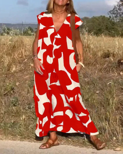 Vestido largo mujer con cuello en V y motivos fluidos