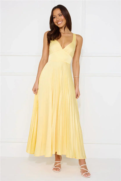Vestido largo amarillo plisado para mujer