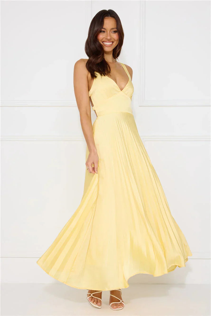 Vestido largo amarillo plisado para mujer