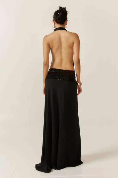 Vestido largo de mujer negro con espalda descubierta y lentejuelas