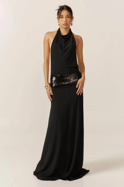 Vestido largo de mujer negro con espalda descubierta y lentejuelas