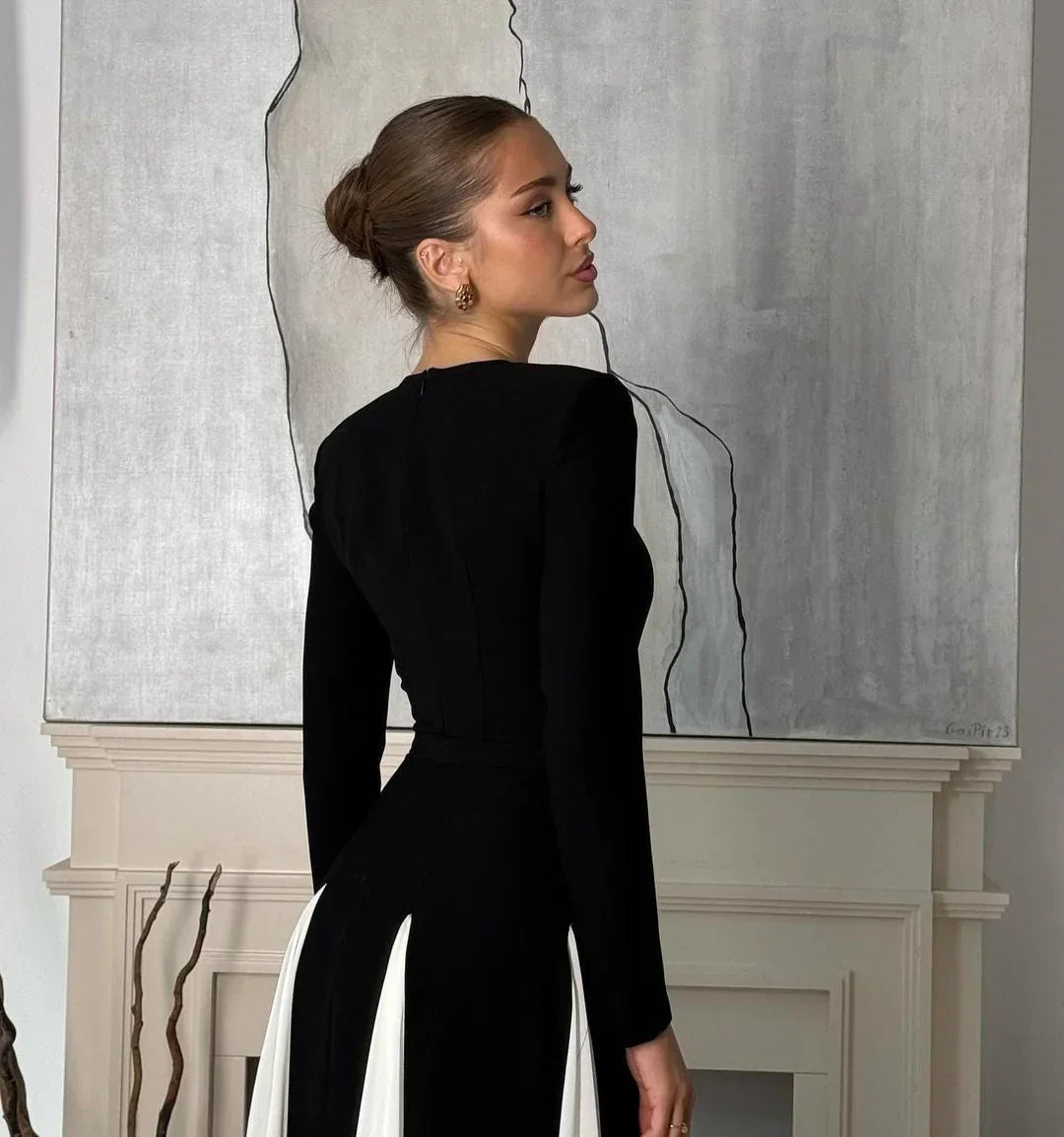 Vestido largo negro plisado para mujer