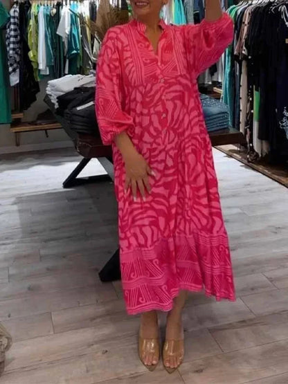Vestido largo fluido de mujer estampado con mangas largas y cuello en V