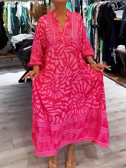 Vestido largo fluido de mujer estampado con mangas largas y cuello en V