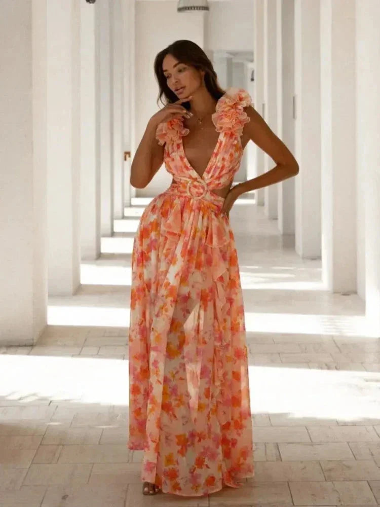 Vestido largo rosa de flores con volantes escote en V cruzado
