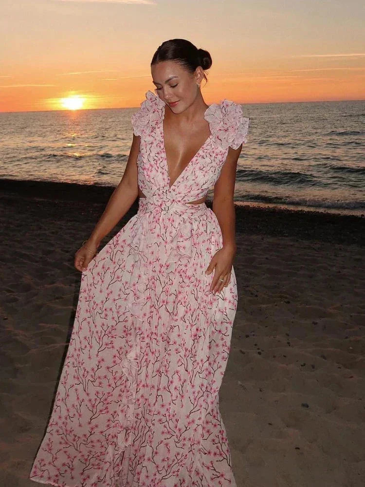 Vestido largo rosa de flores con volantes escote en V cruzado
