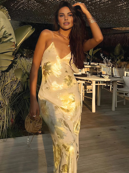 Vestido largo de fiesta dorado estampado floral con tirantes finos
