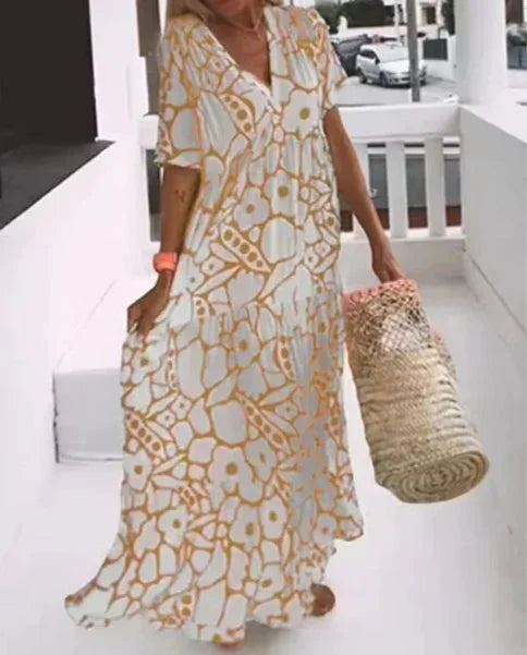Vestido largo verano mujer con escote en V, mangas cortas y estampado floral
