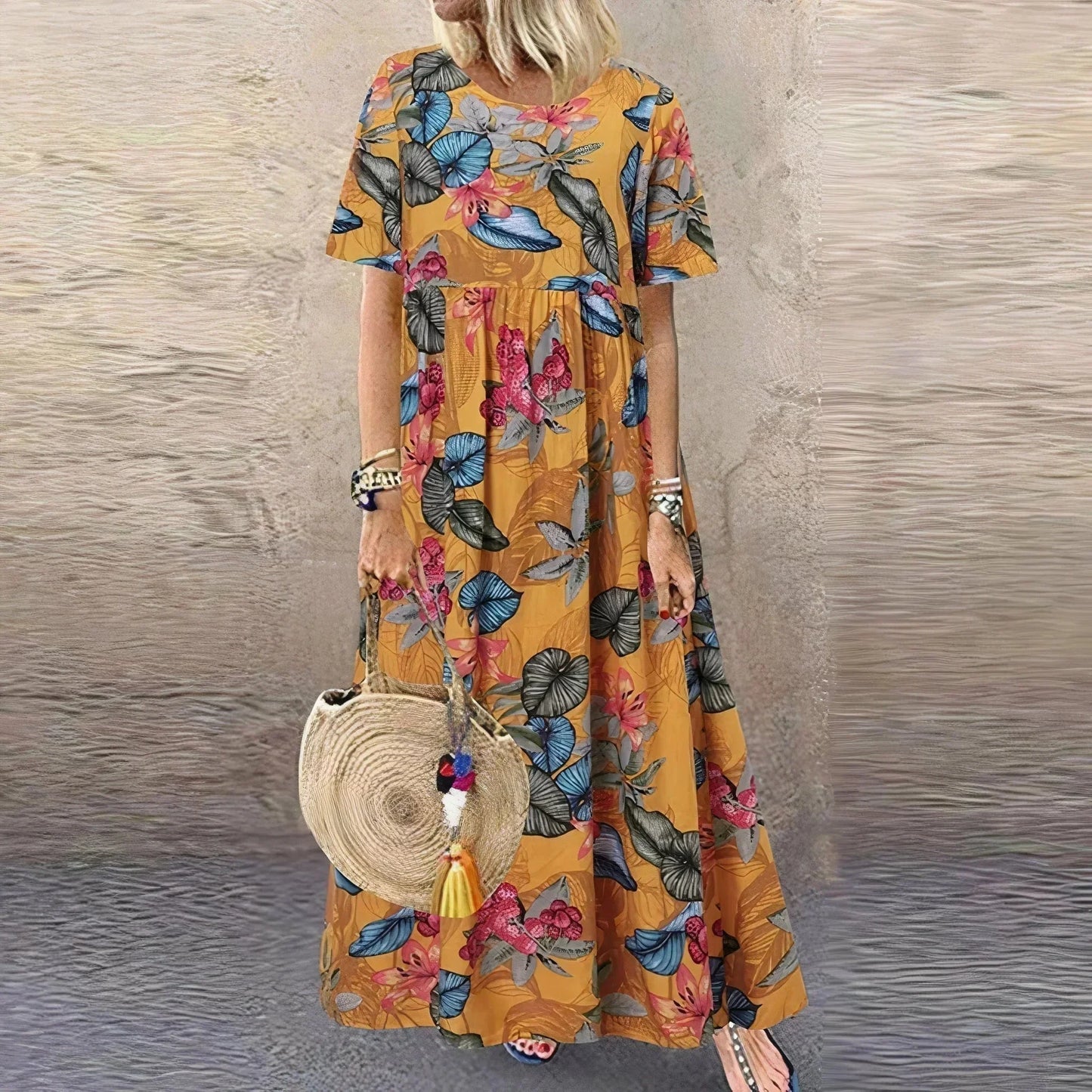 Vestido largo con volantes de estampado botánico y mangas cortas