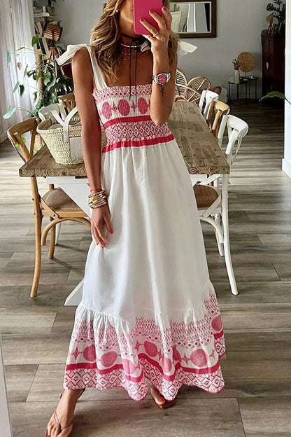 Vestido largo blanco con motivos rosas y escote cuadrado