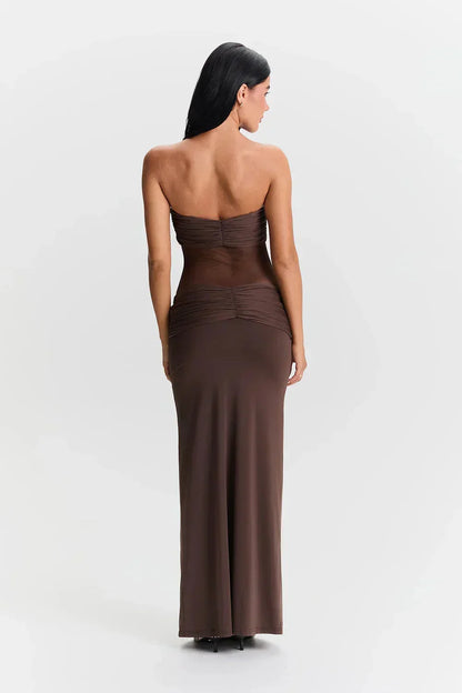 Vestido largo palabra de honor con transparencias y lazos