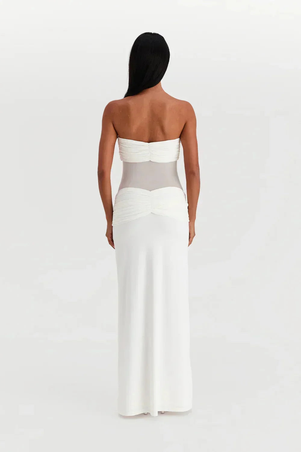Vestido largo palabra de honor con transparencias y lazos