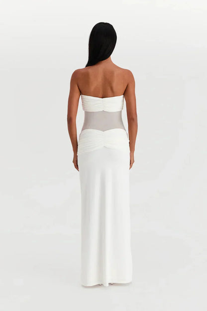 Vestido largo palabra de honor con transparencias y lazos