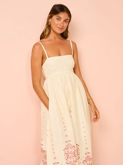 Vestido largo de mujer crema con bordado floral de rosas