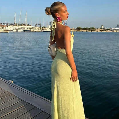 Vestido largo mujer espalda descubierta con flor y abertura