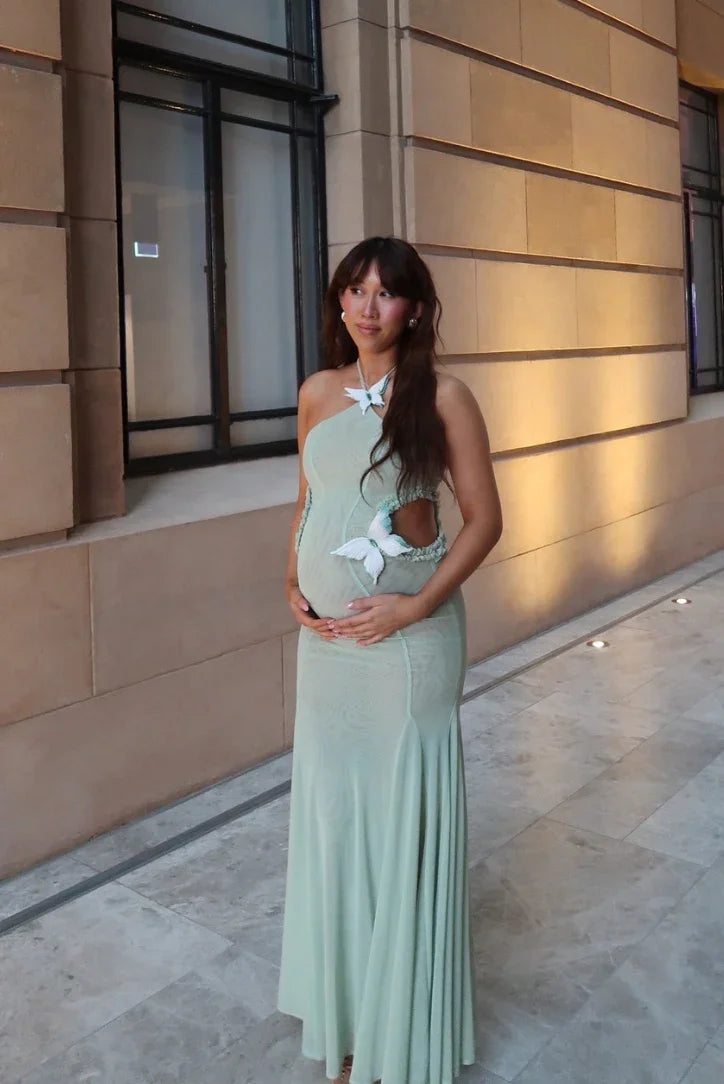 Vestido largo de mujer verde con recorte de mariposa