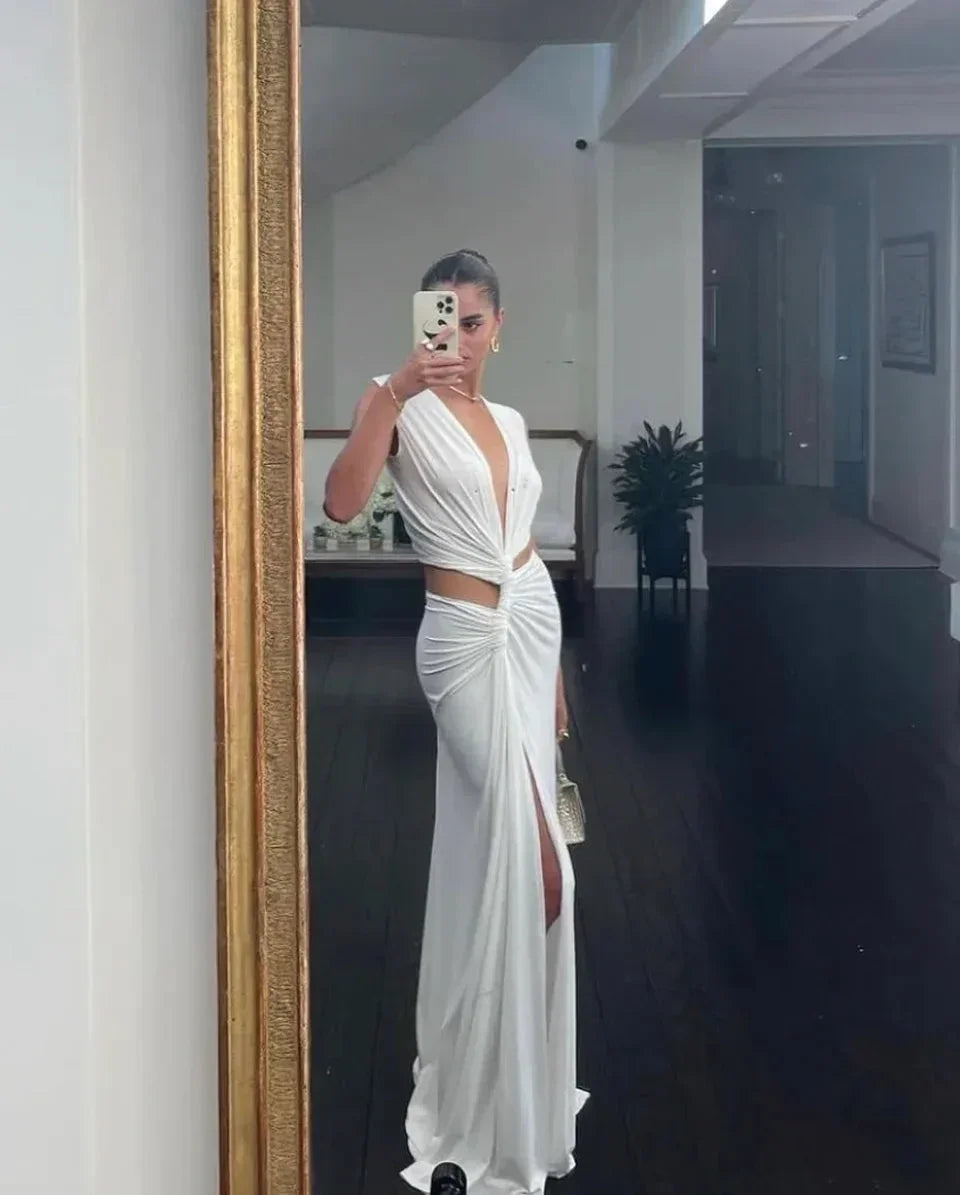 Vestido largo con abertura espalda descubierta con cuello en V y recortes