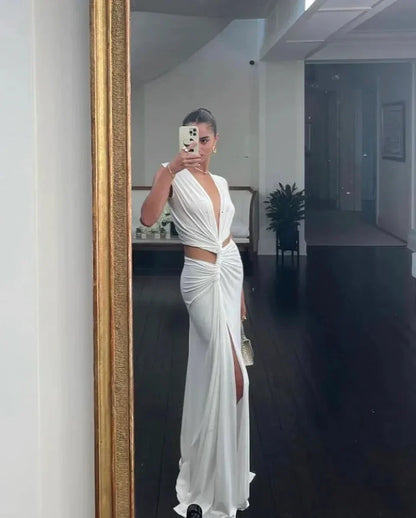Vestido largo con abertura espalda descubierta con cuello en V y recortes