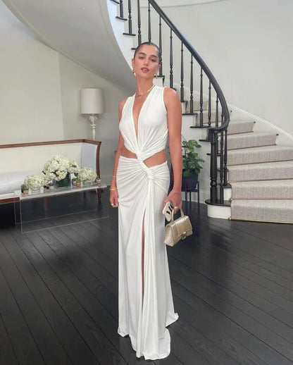 Vestido largo con abertura espalda descubierta con cuello en V y recortes