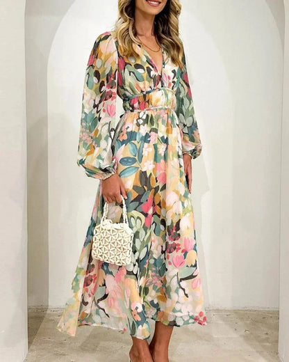 Vestido largo floreado con mangas largas y cuello en V boda primavera