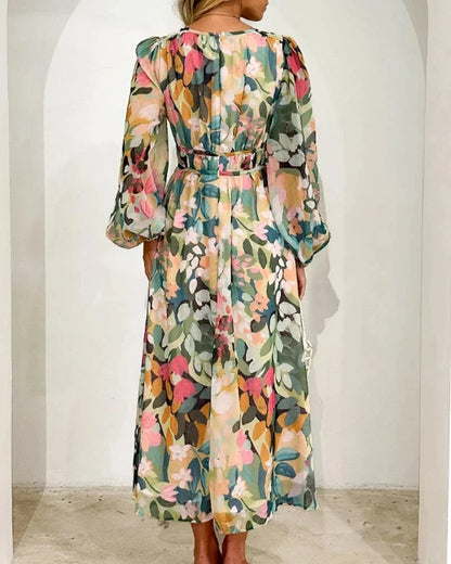 Vestido largo floreado con mangas largas y cuello en V boda primavera