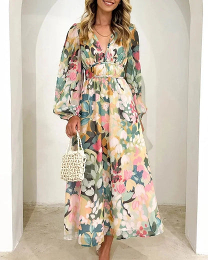 Vestido largo floreado con mangas largas y cuello en V boda primavera