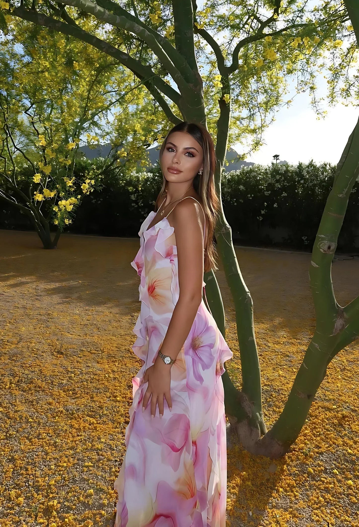 Vestido largo mujer rosa con flores y volantes verano
