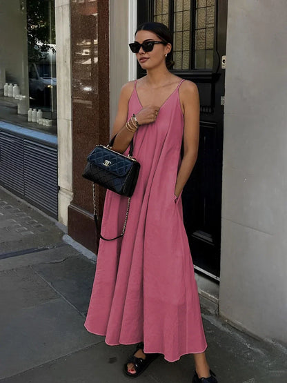 Vestido largo fluido de mujer con tirantes finos y volantes