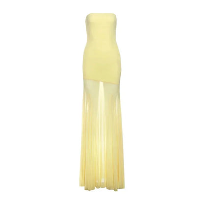 Vestido largo de mujer amarillo sin tirantes con falda transparente