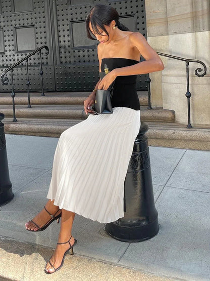 Vestido largo de mujer sin tirantes con falda plisada